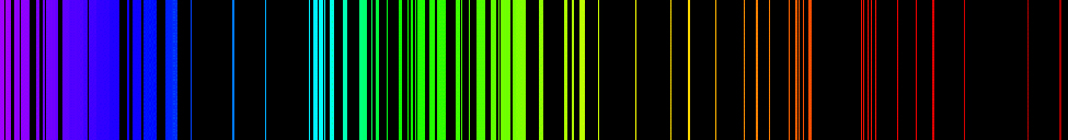 Figures shows the emission spectrum of iron. Numerous overlapping emission lines are present in the visible part of the spectrum.